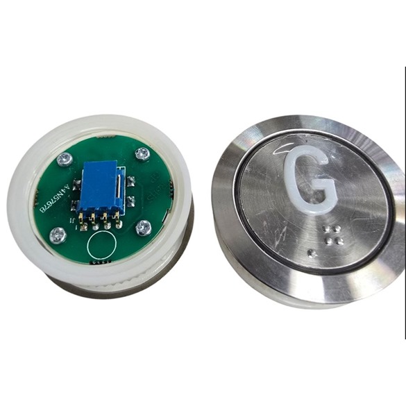 Genesis button G with braille